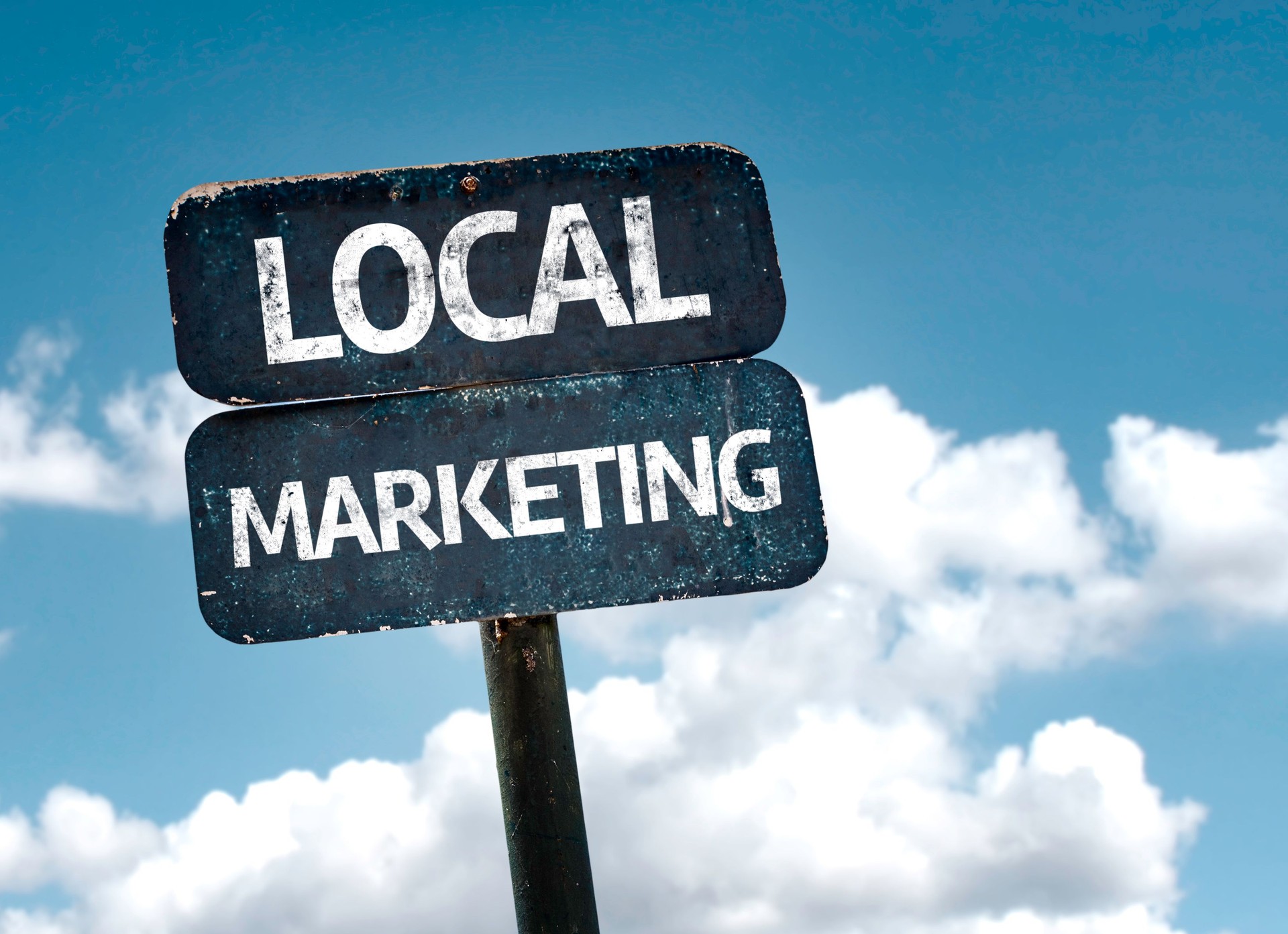 Local Marketing sign with clouds and sky background